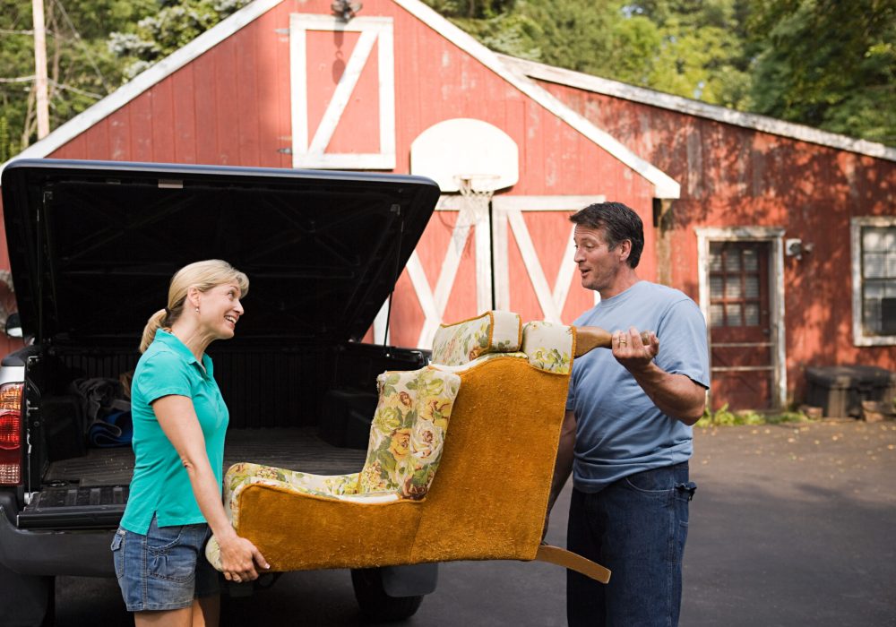 couple-moving-armchair-2024-11-03-05-03-13-utc-scaled.jpg